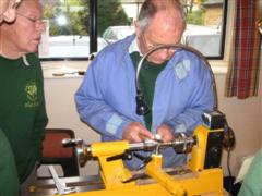 Howard turning brass parts for a box game